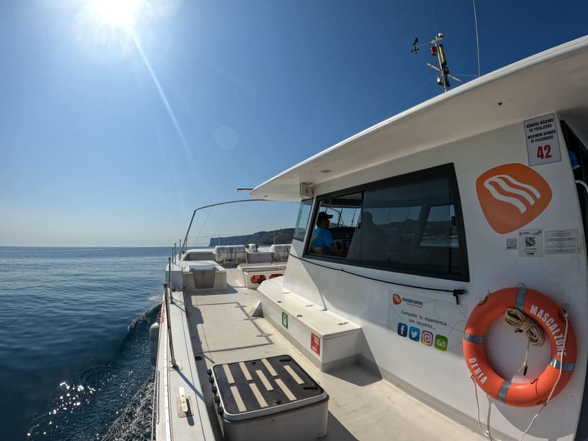 Altea: Motor catamaran with optional lunch and swimming stop - Optional onboard Valencian lunch: paella, fruit, and one included drink