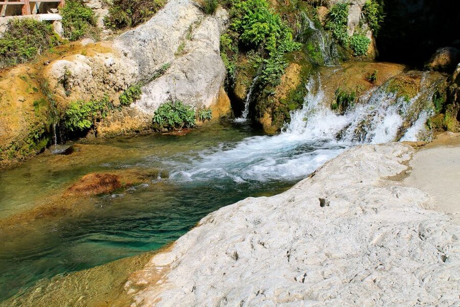 From Alicante: Guadalest Valley and Algar Waterfalls Tour - Fuentes del Algar waterfalls: the protected springs you can actually cool off in