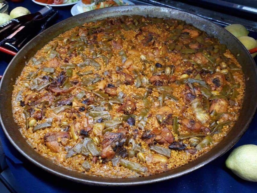 From Dénia/Jávea: Cala Blanca Boat Trip with Jet Ski & Lunch - The paella lunch at anchor is the real center of gravity