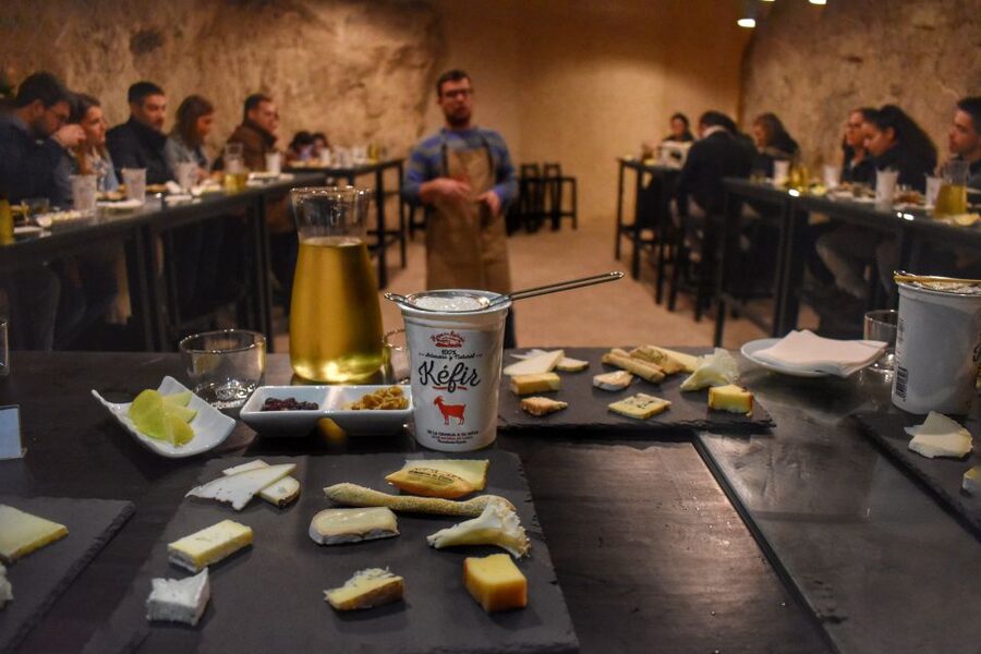 From Valencia: Guided Cheese Factory Tour with Wine Tasting - Pedrones cheese factory: three brothers, goat milk, and aging caves