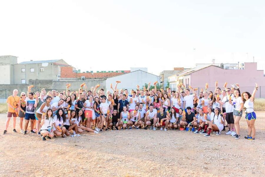 From Valencia: La Tomatina 2025 - Your day at a glance: 7:00 departure, the 12:00 firecracker, then parties