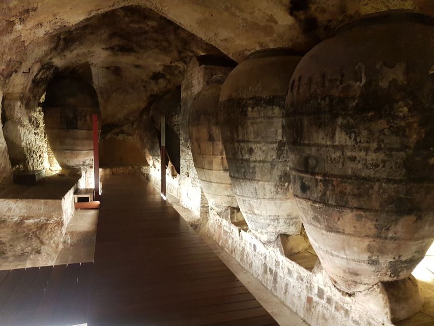 From Valencia: Utiel-Requena Wine Tour and Traditional Lunch - Requena’s medieval underground winery, history you can actually smell