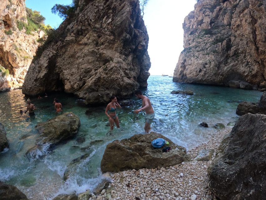 Granadella: Caló, Cova Llop Marí, and Ambolo Kayak Trip - Who this kayak and snorkeling trip suits best