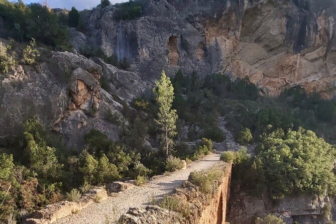 Hiking Tour of the Roman Aqueduct of Peña Cortada and Ruta de Agua - Peña Cortada aqueduct walk: crossing the Roman span and reading the views