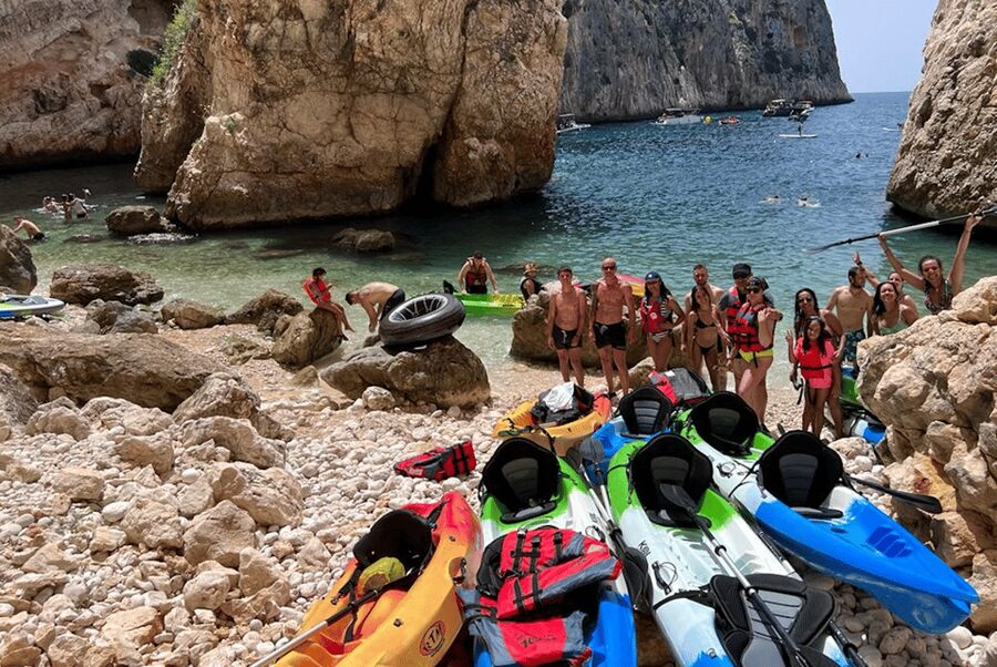 kayak route in granadella javea cave llop marí,cala en caló - Cala en Caló: guided time, photo stop, and that turquoise-shades feeling