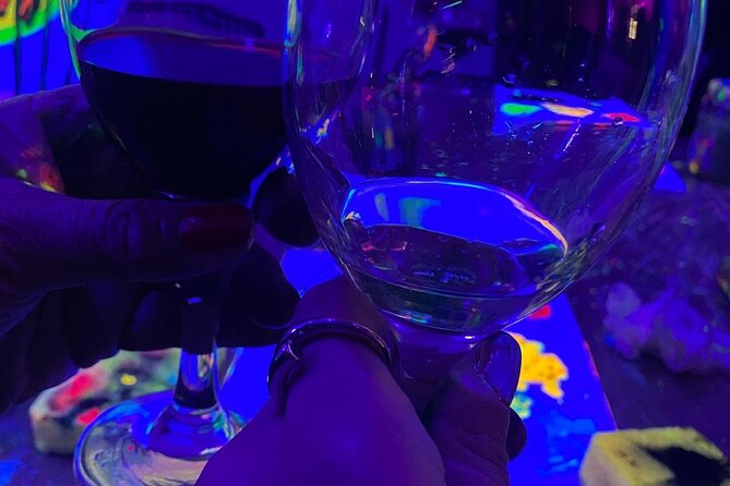 Paint a neon fluorescent picture while drinking unlimited wine - Your Drinks Routine: Unlimited Wine and Water, With a Realistic Pace