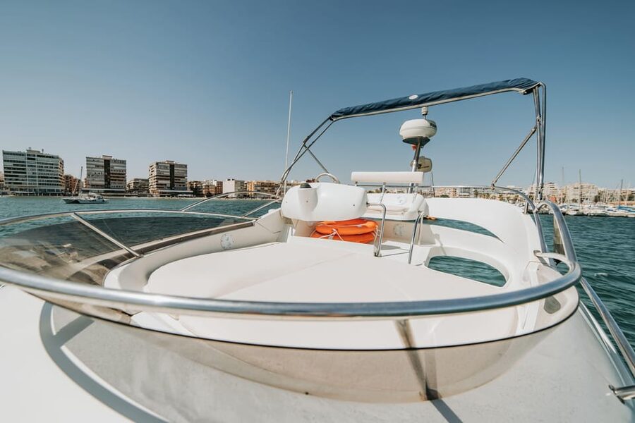 Sailing with sunset and swim in the sea - Punta Prima: calmer views and another coastal mood