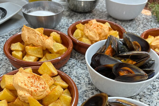 Seafood paella cooking class, tapas and visit to Ruzafa market. - Shopping for Paella Ingredients at Mercado de Ruzafa