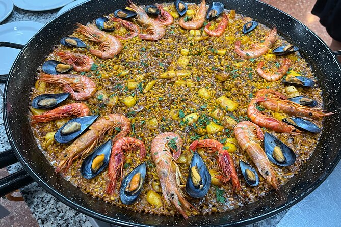 Seafood paella cooking class, tapas and visit to Ruzafa market. - Step-by-Step Seafood Paella Cooking, Hands-On