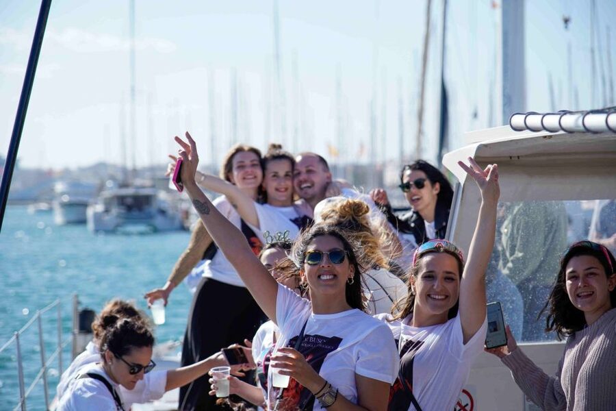 Valencia: Catamaran Party Boat - Boarding and the On-Deck Layout: Shaded Comfort vs Nets Sunbathing