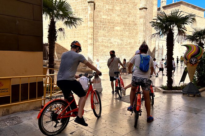 Valencia City Highlights in Guided Bike or E-Bike Tour - Mercat Central and Church Stops: Food Scent, Stone Detail