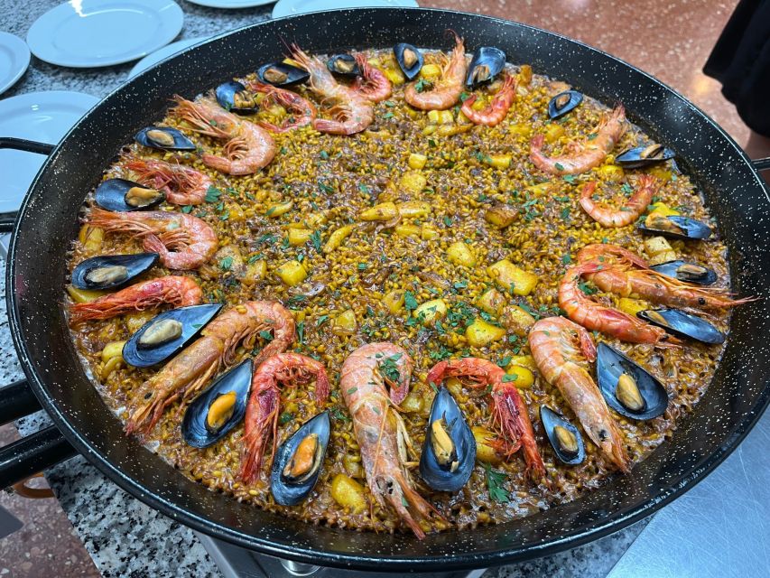 Valencia: Evening Guided Paella Workshop, Tapas, and Drinks - Dessert that seals the deal: coca de llanda and seasonal fruit