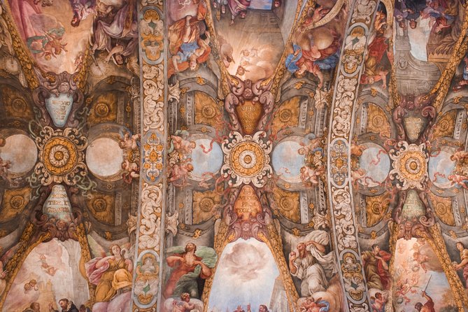 Valencia Old Town Tour with Wine & Tapas in 11th Century Historic Monument - Barrio del Carmen dinner: paella, tapas, dessert, and regional wines in a historic monument