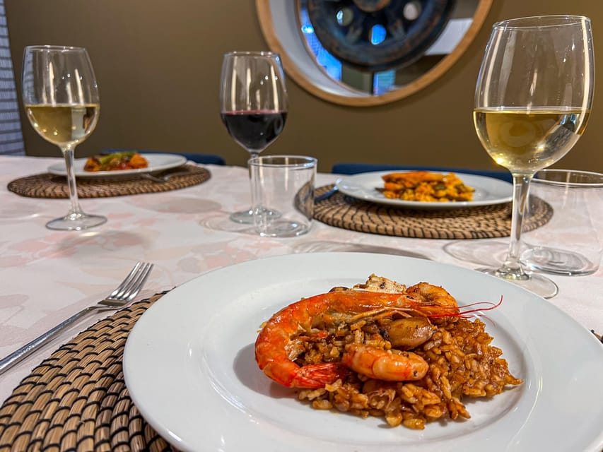 Valencia: Paella Cooking Class with Central Market Tour - Tapas, wine, and your finished paella at the same table