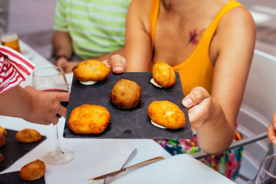Valencia: Private Food Tour – 10 Tastings with Locals - Walking through Valencia highlights, with context at every pause