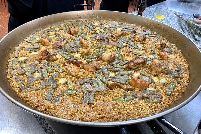 Valencian paella cooking class, tapas and visit to Ruzafa market. - Starting at Parroquia de San Valero, then straight to Mercado de Ruzafa