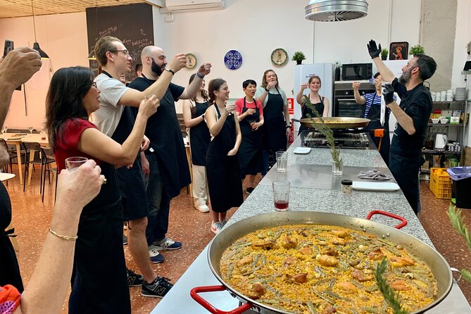 Valencian paella cooking class, tapas and visit to Ruzafa market. - Sangria workshop plus tapas before the paella