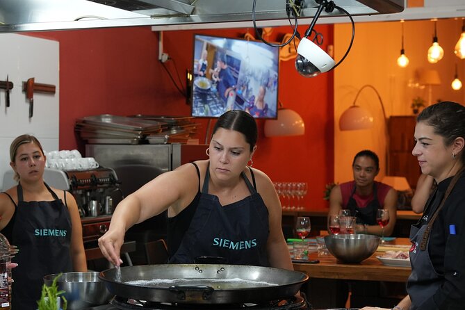 Valencian paella workshop and visit to the Algiros market - Mercado Algirós first, because paella has roots