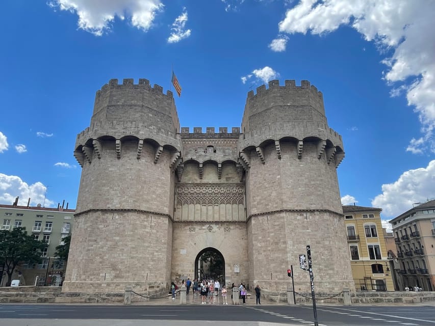 Zoom Through Valencia: Top 25 Hotspots on E-Scooters - Torres de Serranos and Turia Gardens: Big Views, Short Rest